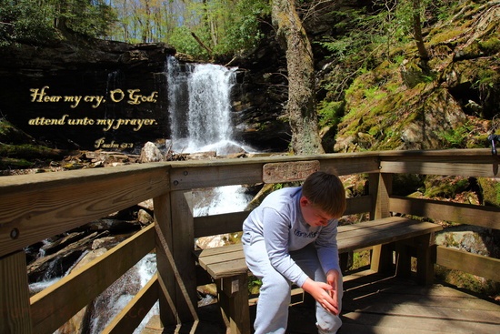 Psalm 61 Verse 1 - Young Christian Praying at Waterfalls